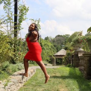 Red backless dress crocheted with red hypoallergenic yarns.