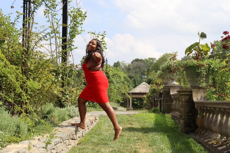 Red backless dress crocheted with red hypoallergenic yarns.